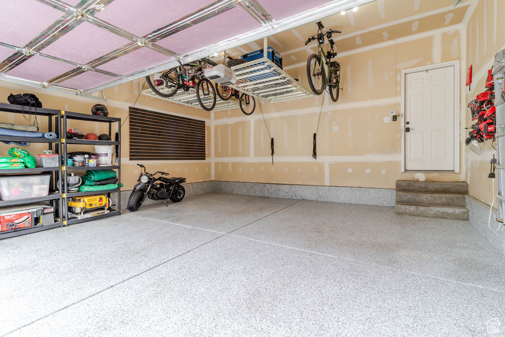 Garage featuring baseboards