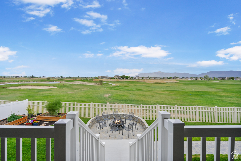 View of yard with a fire pit and a mountain view
