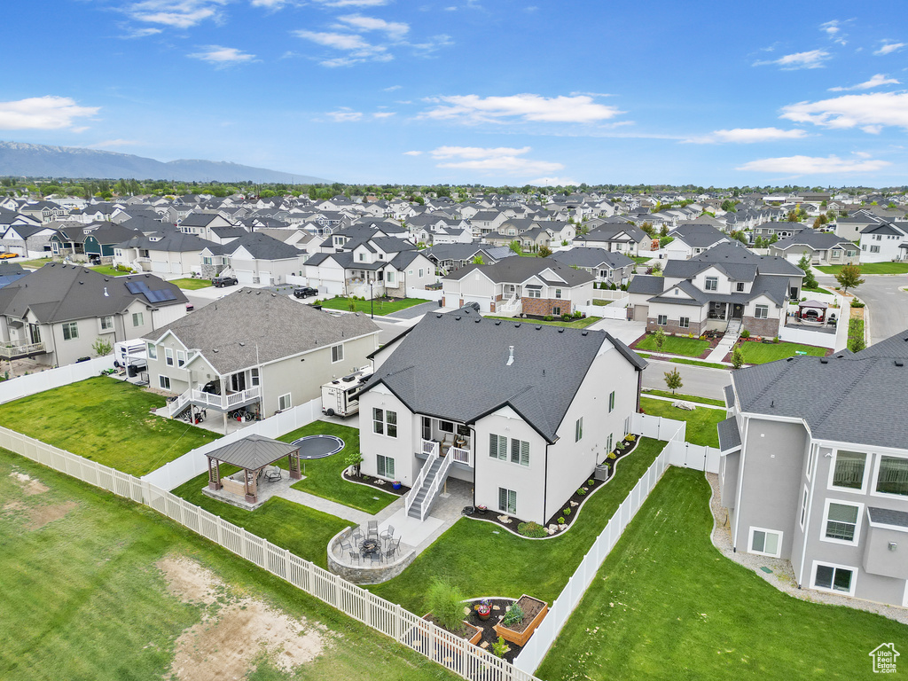 Aerial view of residential area with a mountainous background