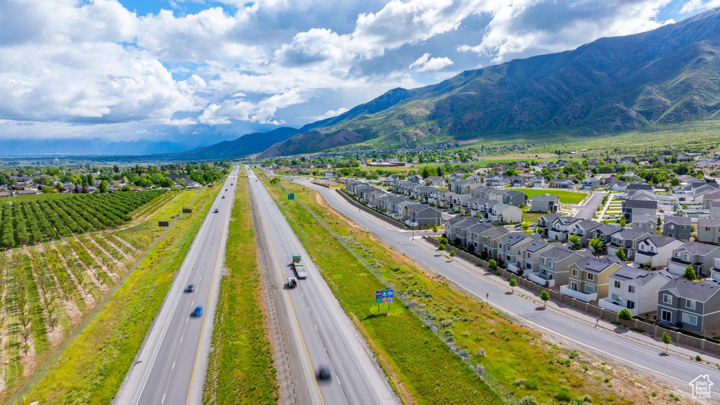 Aerial perspective of suburban area featuring a mountainous background