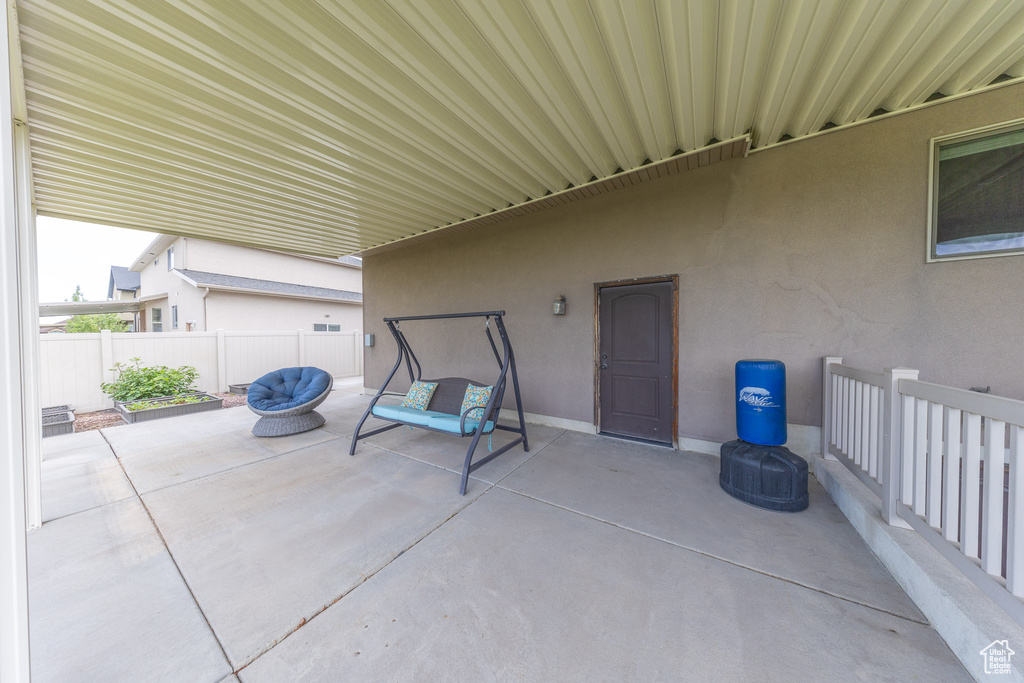 View of patio / terrace featuring fence