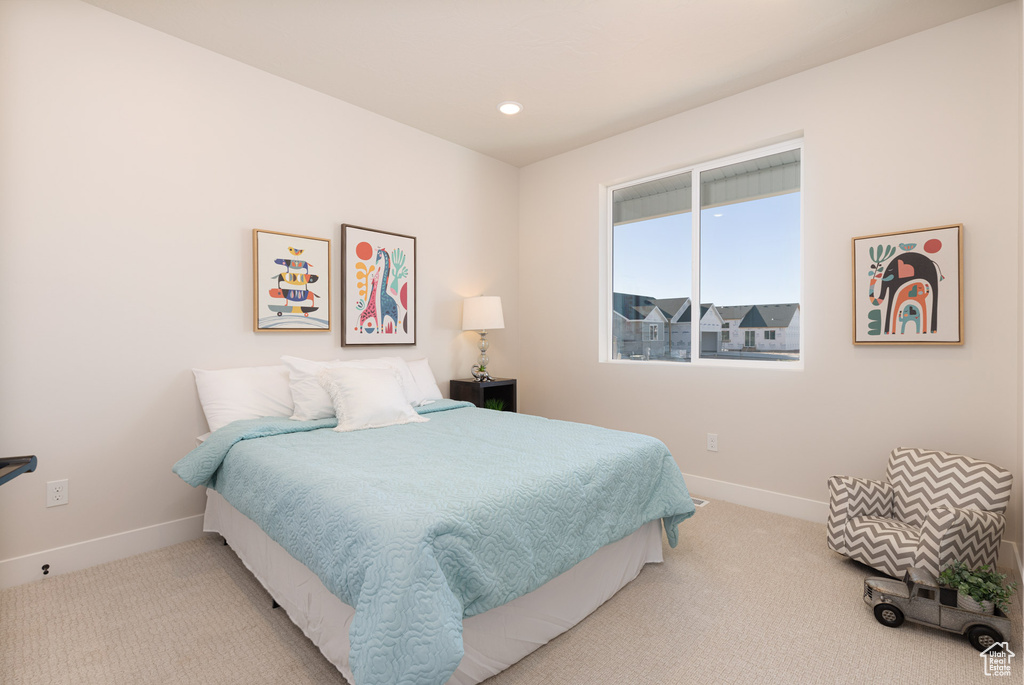 Bedroom featuring baseboards, carpet, and recessed lighting