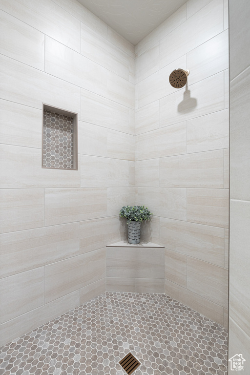 Bathroom with a tile shower