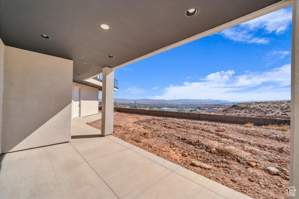 View of patio / terrace with a mountain view