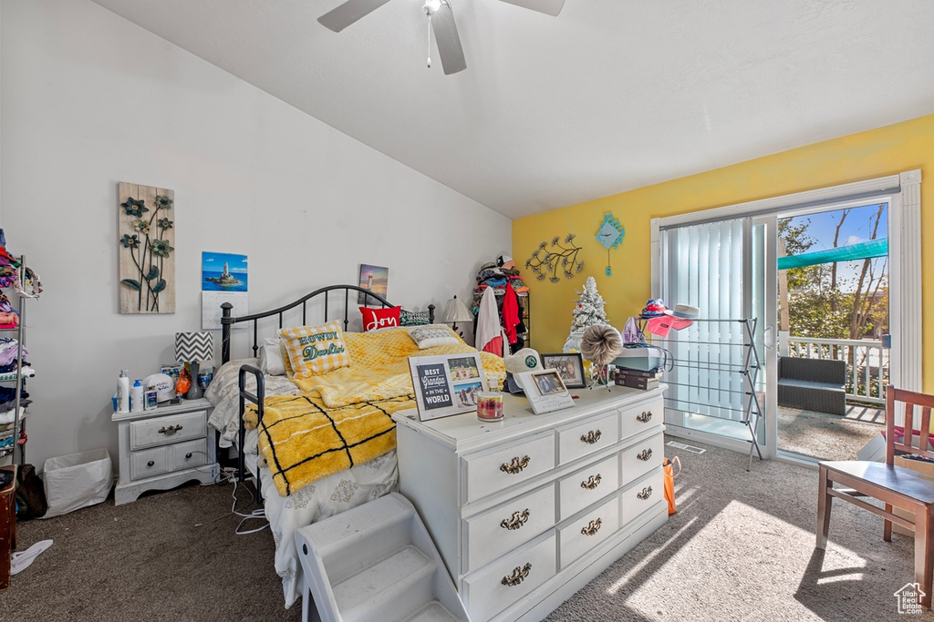 Bedroom featuring carpet floors, access to exterior, vaulted ceiling, and ceiling fan