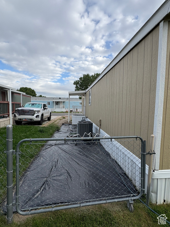 View of yard with cooling unit
