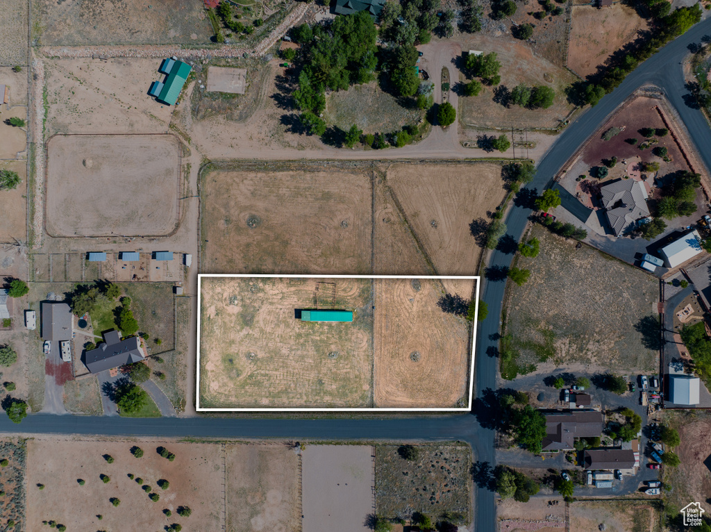 Aerial map of property and surrounding area featuring property parcel outlined