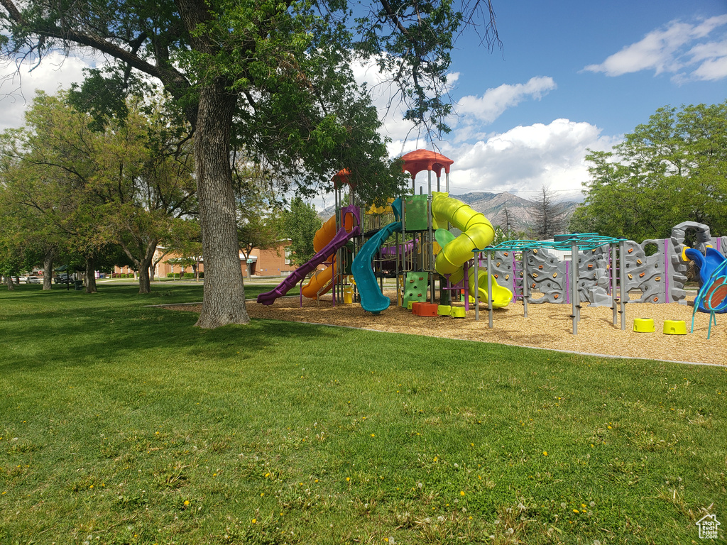 Community play area featuring a lawn