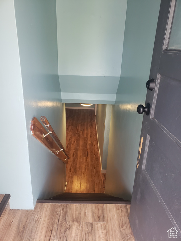 Stairway with wood finished floors