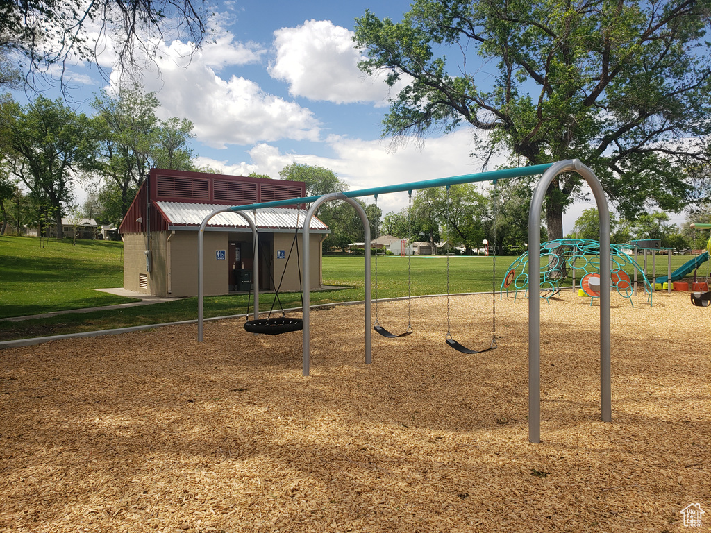 Communal playground featuring a yard
