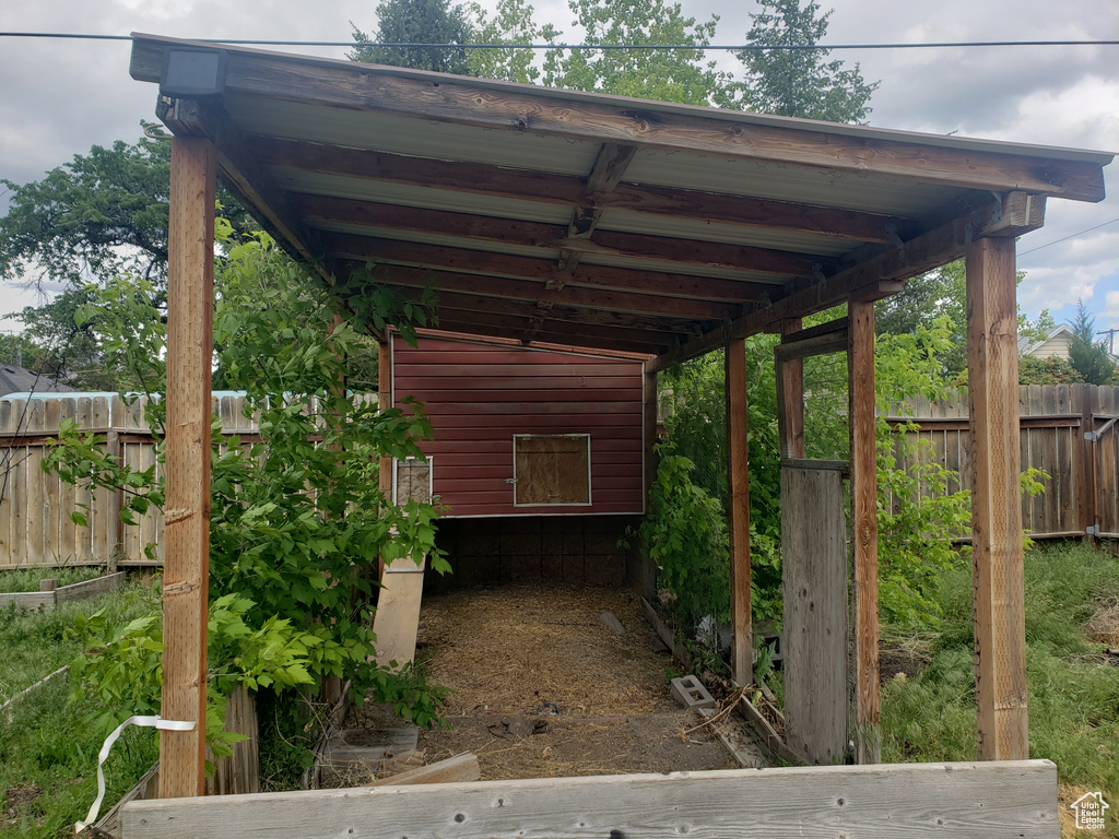 View of car parking featuring fence