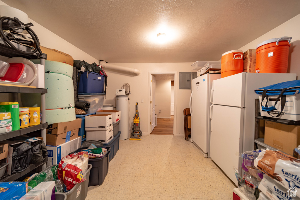 Storage area with electric panel and water heater