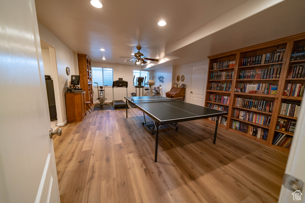 Playroom featuring a ceiling fan, recessed lighting, light wood-type flooring, and baseboards