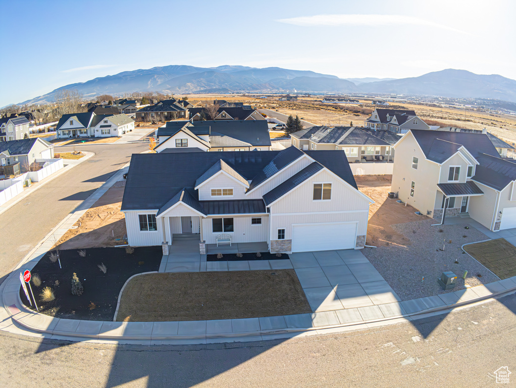 Aerial perspective of suburban area featuring mountains
