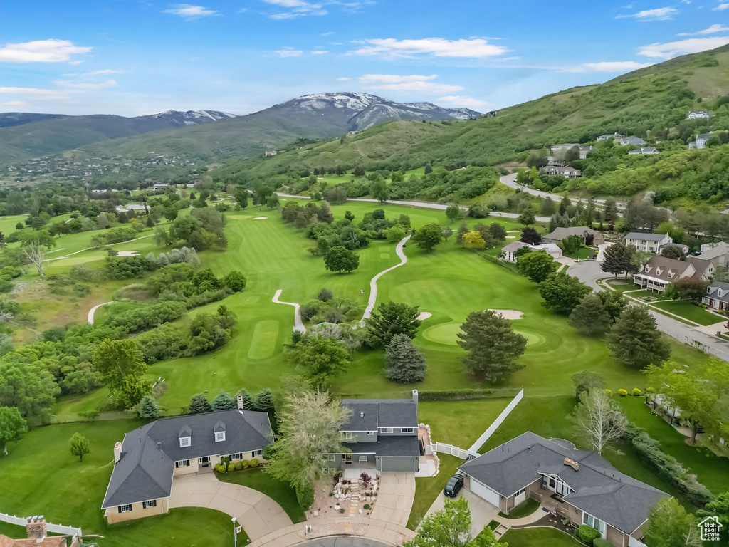 Aerial view of mountains and a golf club
