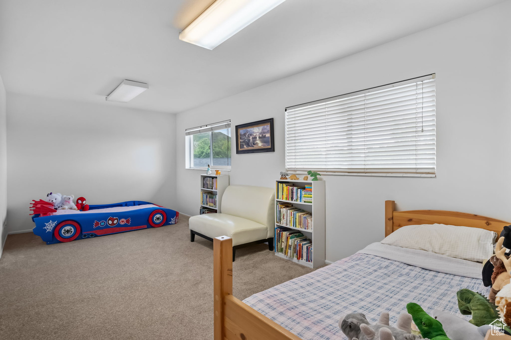 Bedroom featuring carpet