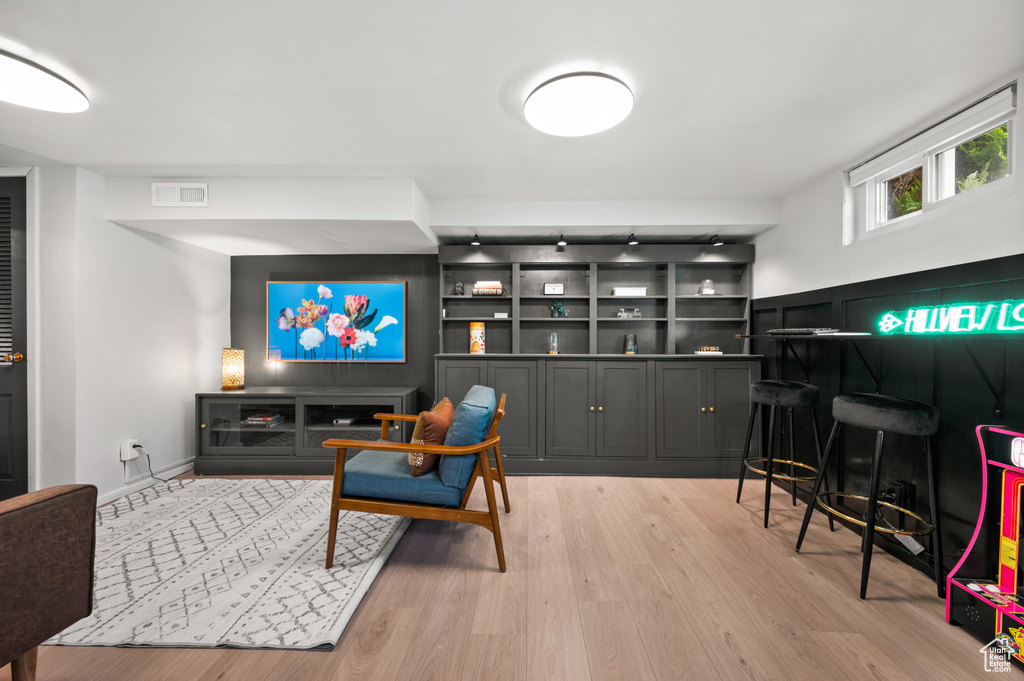 Living room featuring light wood-style flooring