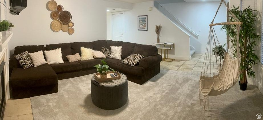 Tiled living room with stairs