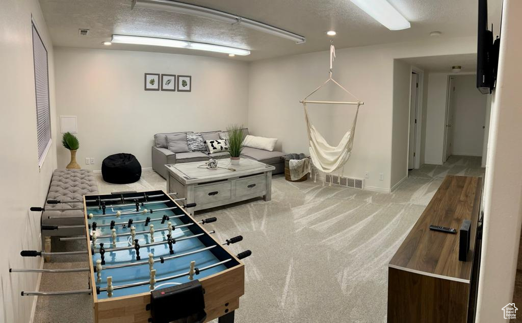 Playroom featuring baseboards, carpet flooring, and recessed lighting