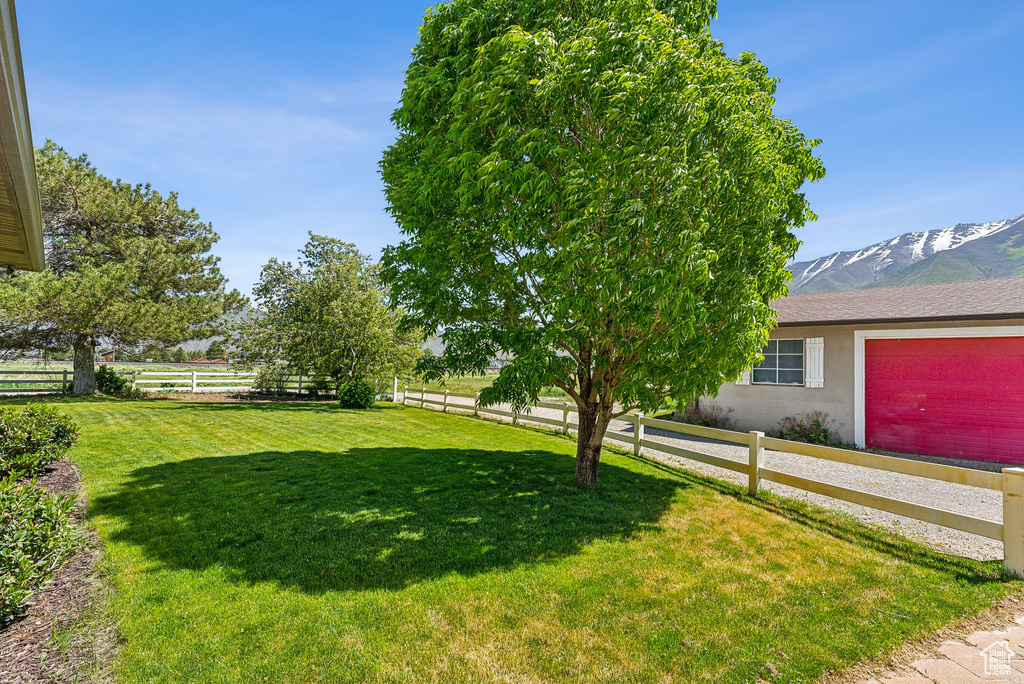 View of yard with a mountain view