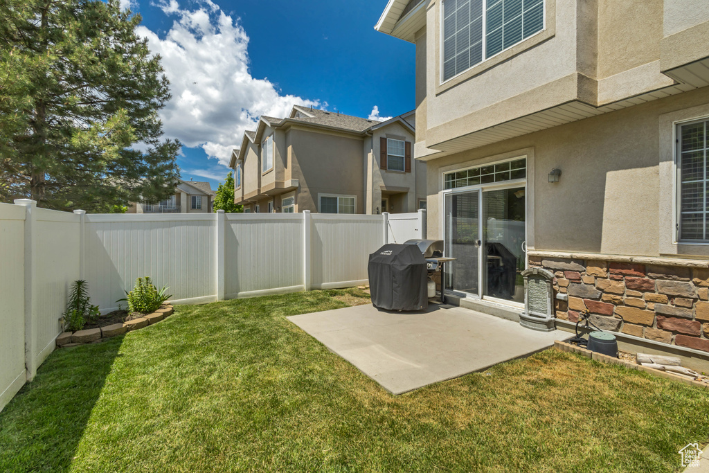 View of yard featuring a patio