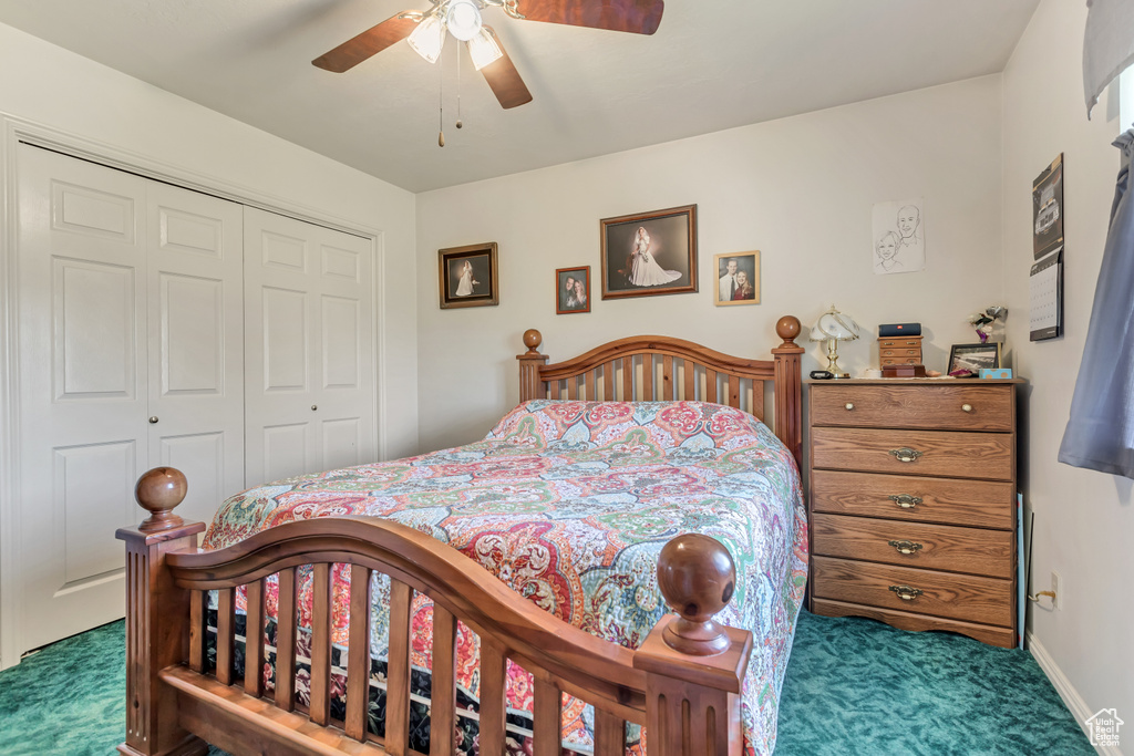 Bedroom with carpet flooring, a closet, ceiling fan, and baseboards