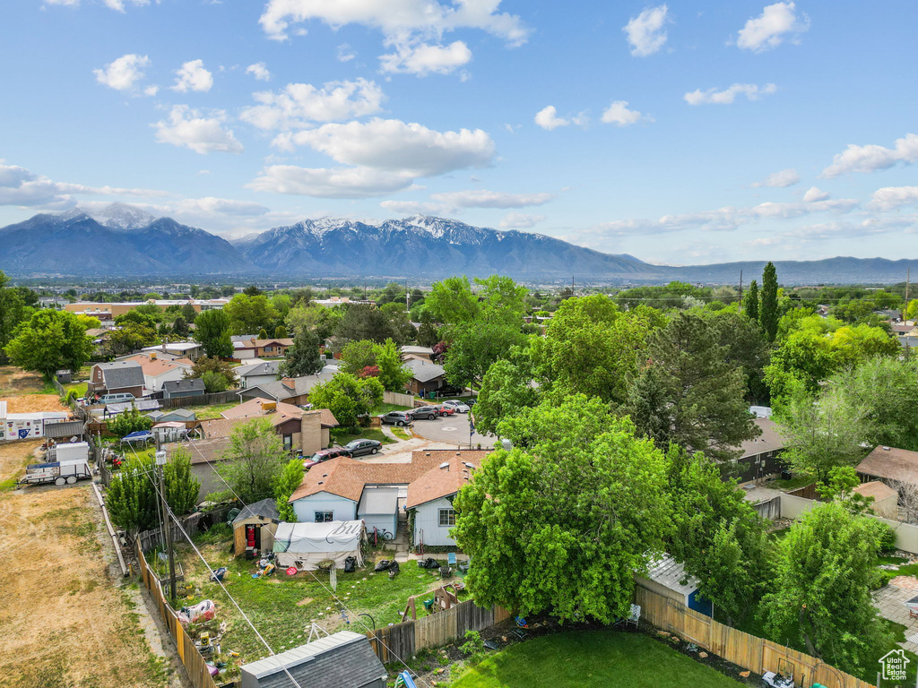 View of mountain background featuring nearby suburban area