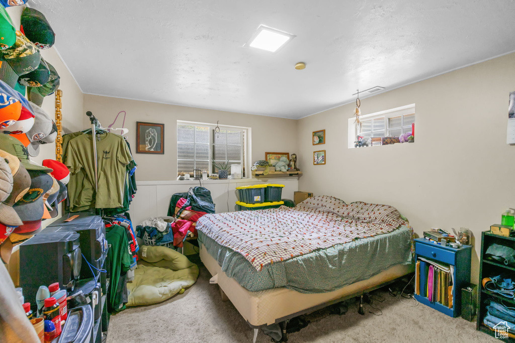 Bedroom featuring carpet floors