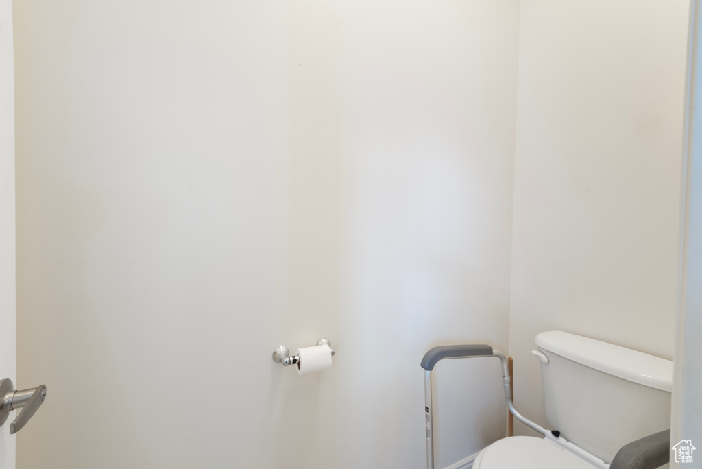 Half bathroom featuring toilet