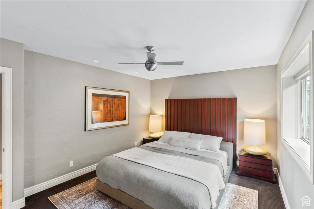 Bedroom featuring baseboards and a ceiling fan