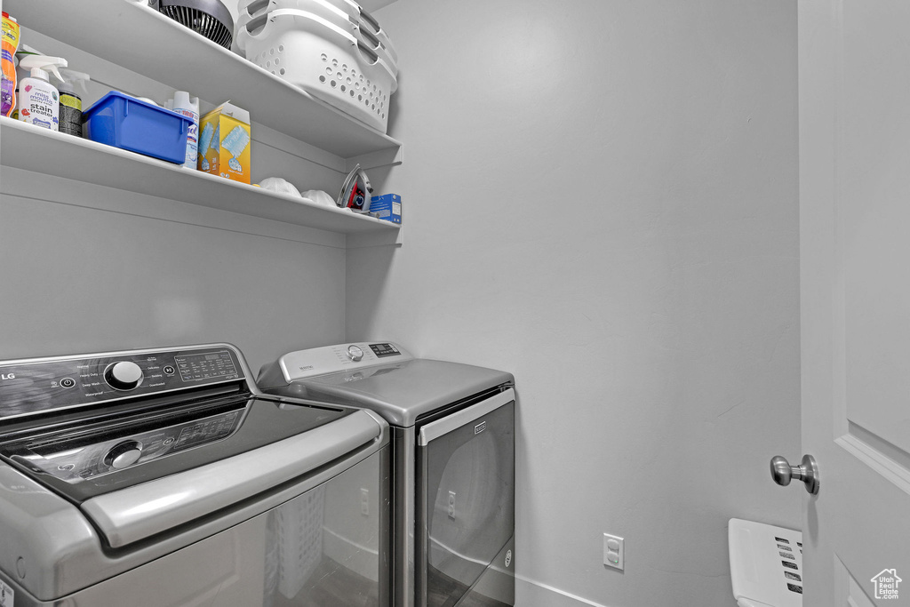 Laundry room featuring washer and dryer