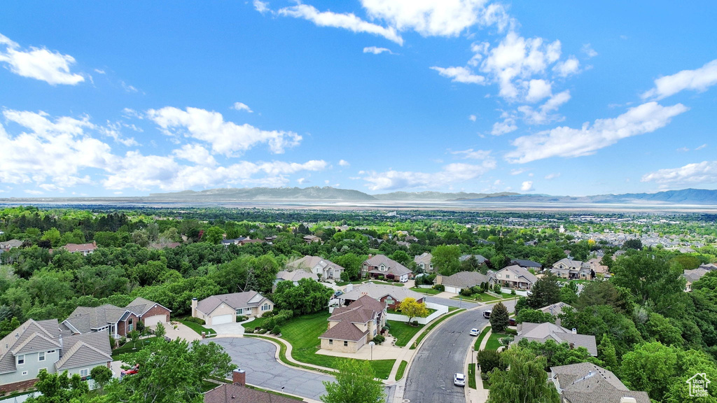 Aerial perspective of suburban area featuring mountains