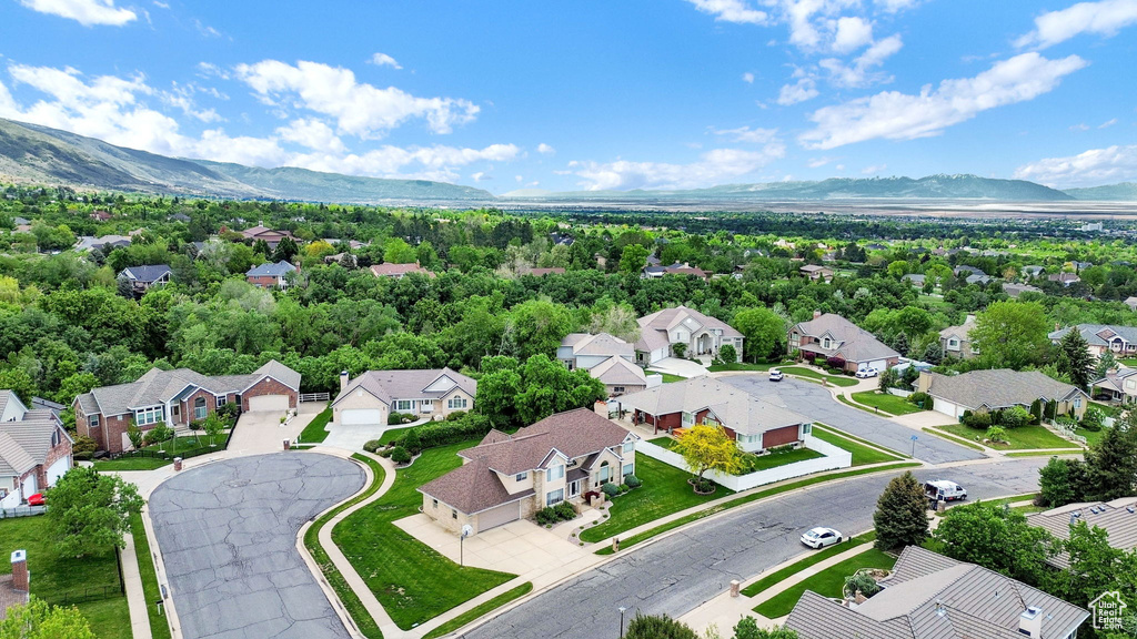 Aerial perspective of suburban area featuring mountains