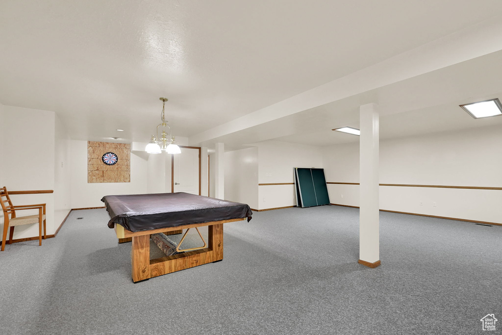 Game room featuring carpet, baseboards, and pool table