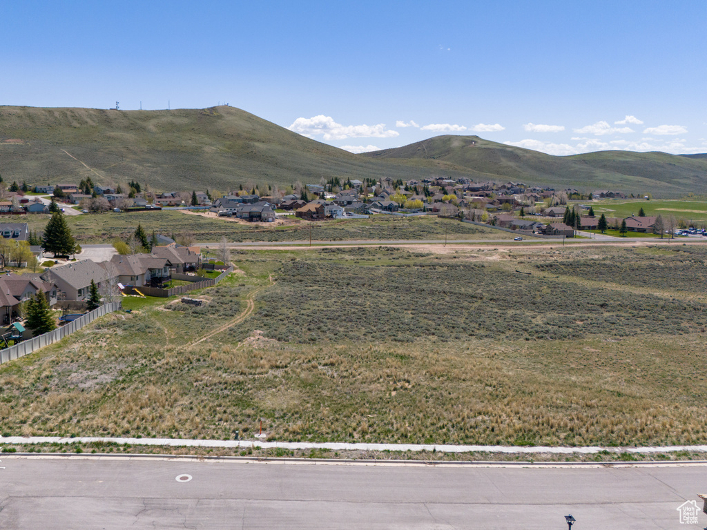Mountain view featuring nearby suburban area
