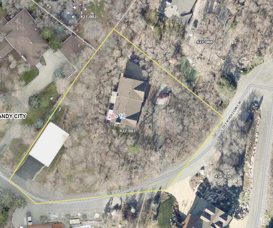 Aerial overview of property\\\\\\\'s location featuring property parcel outlined
