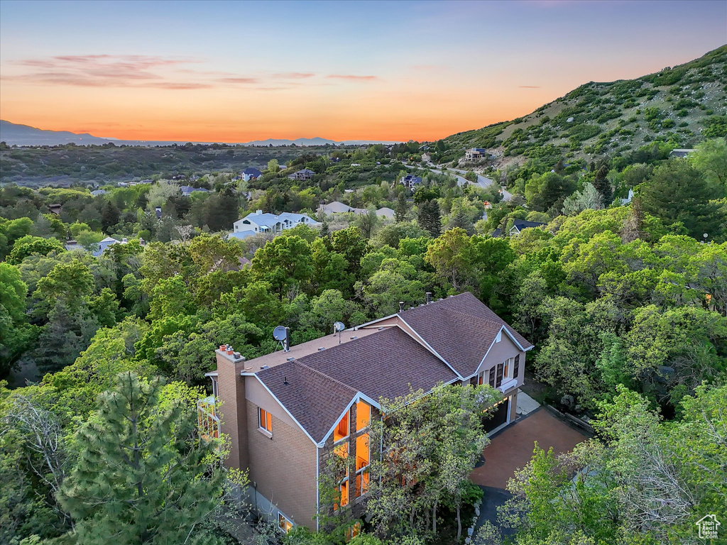 View from above of property featuring a mountainous background