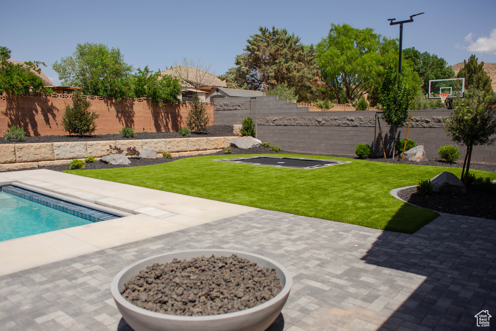 View of yard with a patio