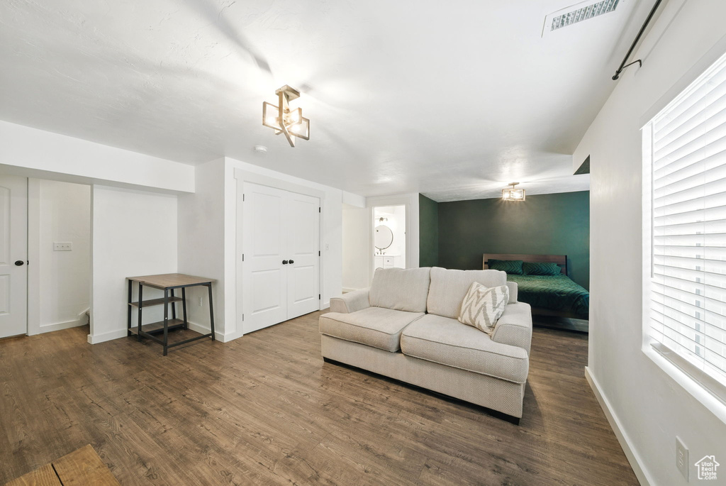 Living room with wood finished floors and baseboards
