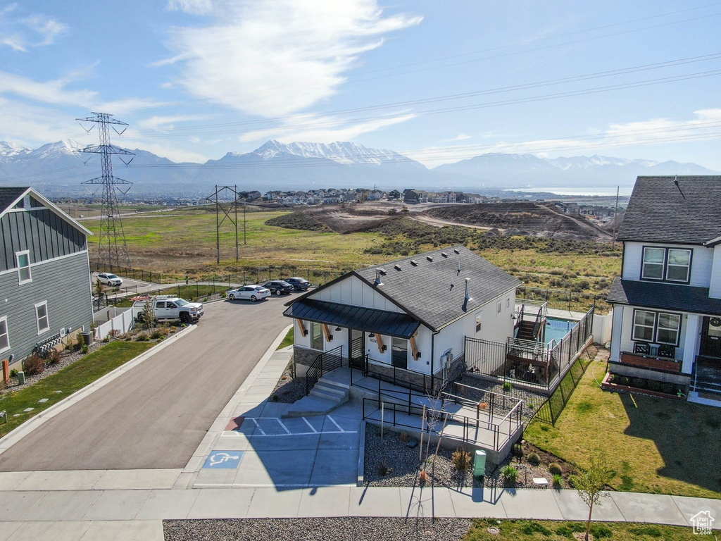 View of subject property featuring mountains