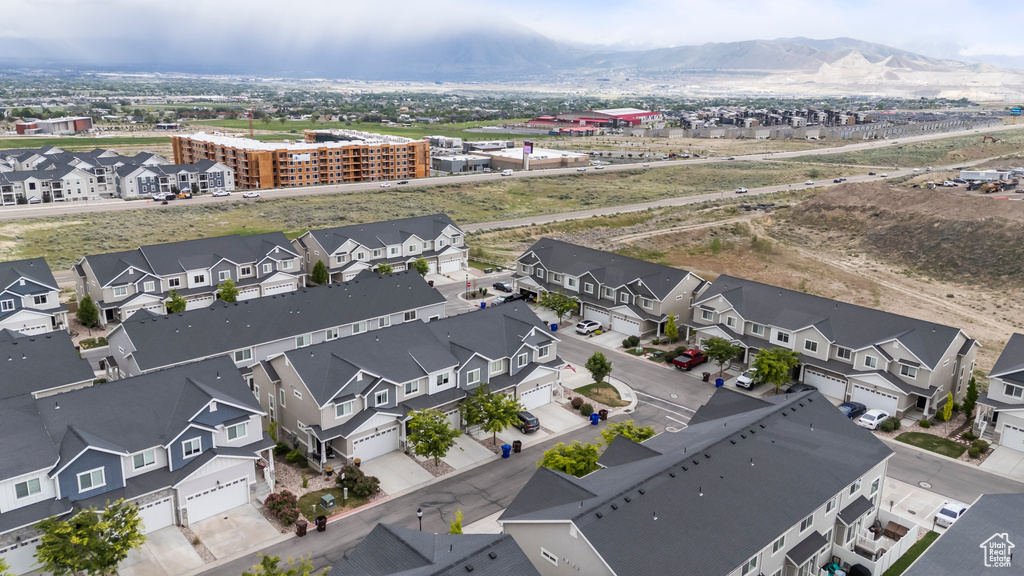 Aerial view of residential area with a mountainous background