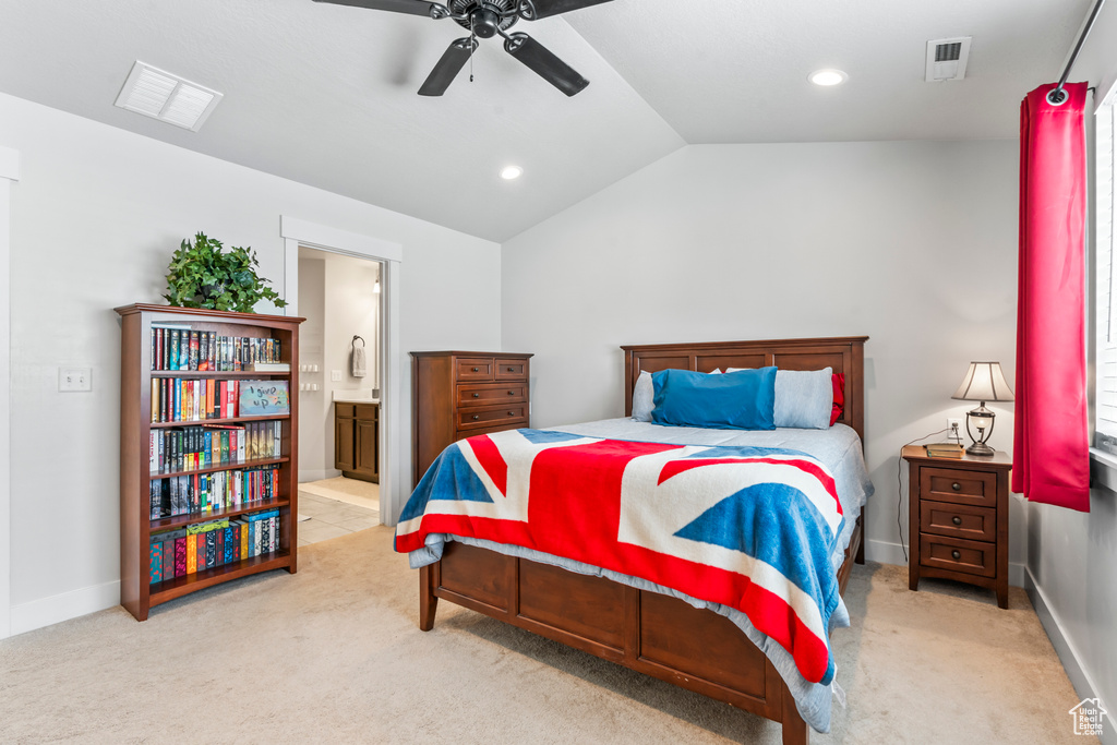 Bedroom with carpet, vaulted ceiling, connected bathroom, a ceiling fan, and recessed lighting