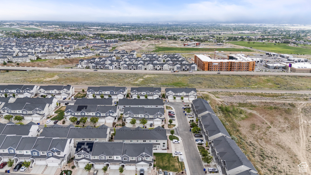 View of property location with nearby suburban area