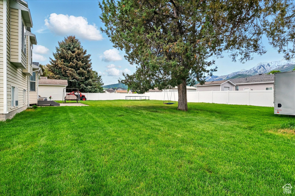 View of yard with a mountain view