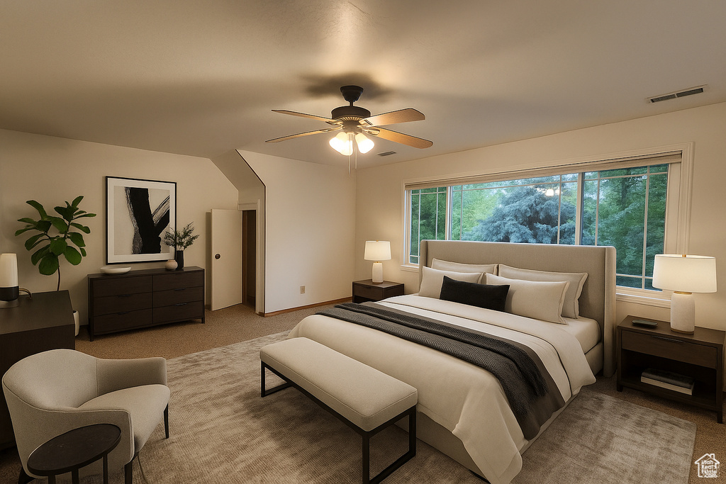 Bedroom with light colored carpet and a ceiling fan