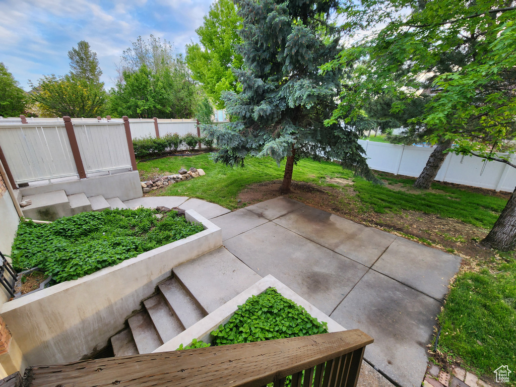 Fenced backyard featuring a patio area
