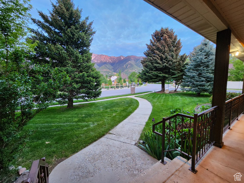 View of green lawn with a mountain view