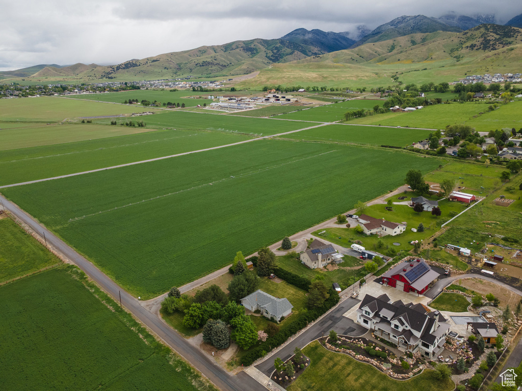Aerial view of sparsely populated area featuring a mountainous background