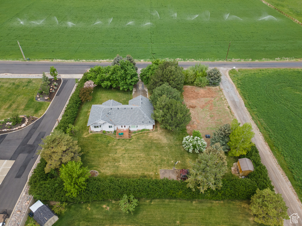 Aerial view of property and surrounding area featuring rural landscape