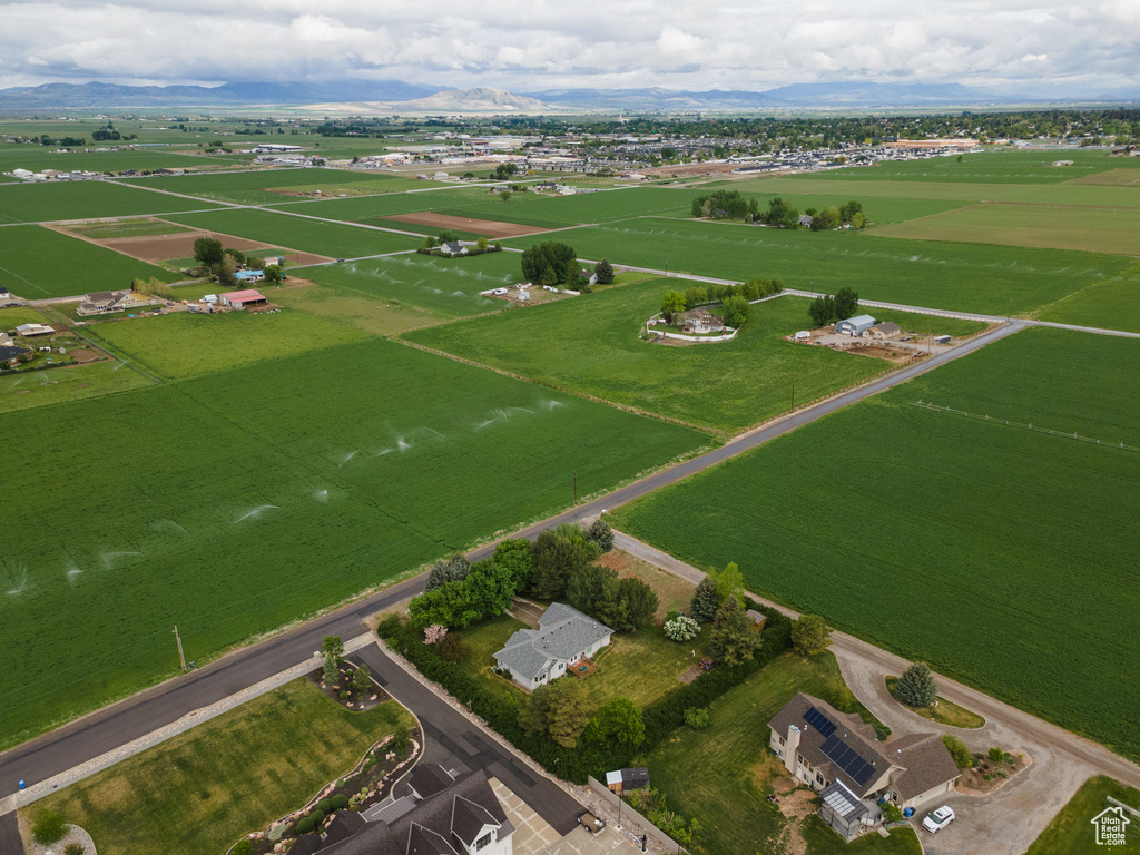 Overview of rural landscape with a mountain backdrop